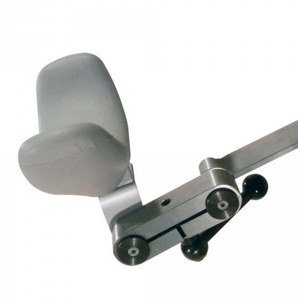 Double articulated head rest mechanism for treatment beds